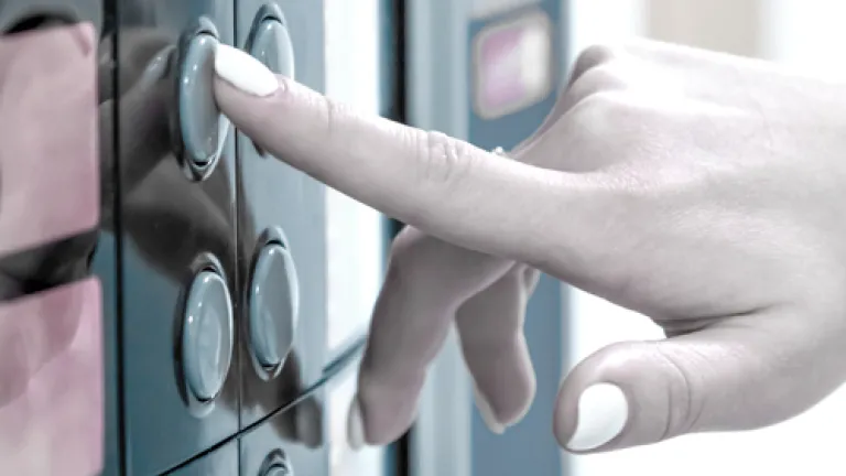 Pushing button at pay station