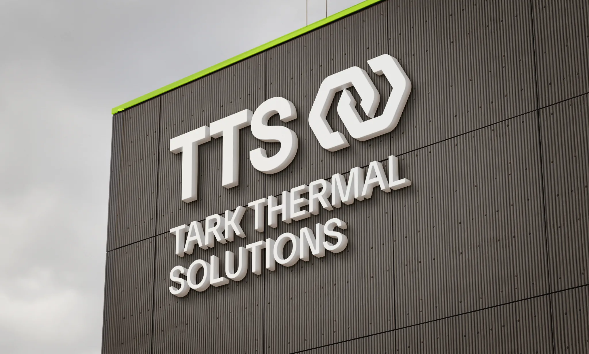 A building with the TTS logo on the top left.